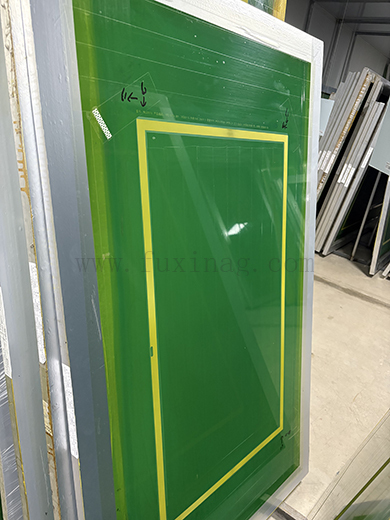 How is the black bezel of cover glass of a touchscreen silkscreen printed?